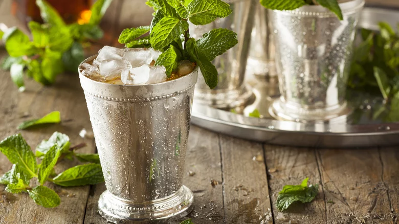 a mint julep sitting on a table